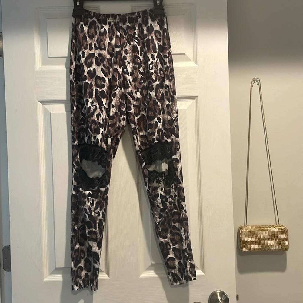 Soft leopard print leggings with black lace knee cut outs